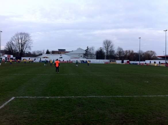 The view during the first half. The quality of the game can be summed up by knowing that one Hendon free-kick (which took at least 3 minutes to take) ended up two-thirds of the way up the fir tree in the picture